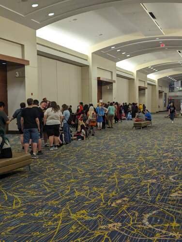 Line of attendees waiting to get into Des Moines Con karaoke event
