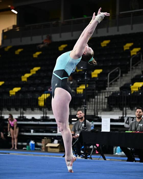 Gymnast finishing a floor routine at the USAG 2024 Level 9 Women's Westerns Championship